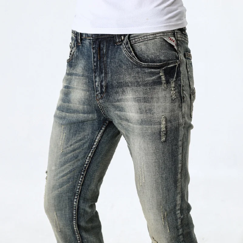 

JXN811 European stretch jeans men's slimming ragged trousers mid-waist washed and whitened electric trousers