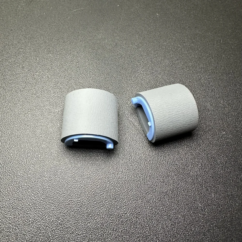 

RL1-1442 RL1-2593 Ролик захвата для HP P1005 P1102 P1102W M1130 M1132 M1212 M125 M125A M127 M12w M26a M203 M227 M477 M130*100