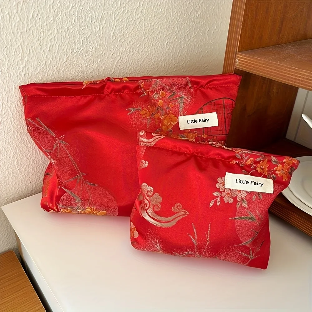 2025 nuevo bolso rojo impreso al azar para madre e hijo, boda, año festivo del zodiaco, cosméticos, almacenamiento de estilo nacional, toi de viaje de alta gama