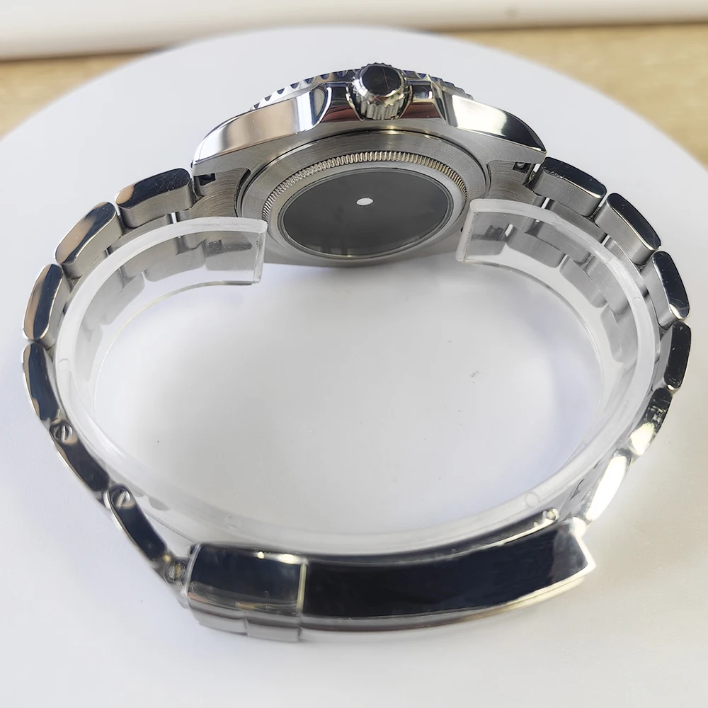 40MM シルバーケース、28.5MM ブルーイルミネーションダイヤルとベゼルストラップ、NH35/36 Miyota 8215 ムーブメントに適したサファイアガラス