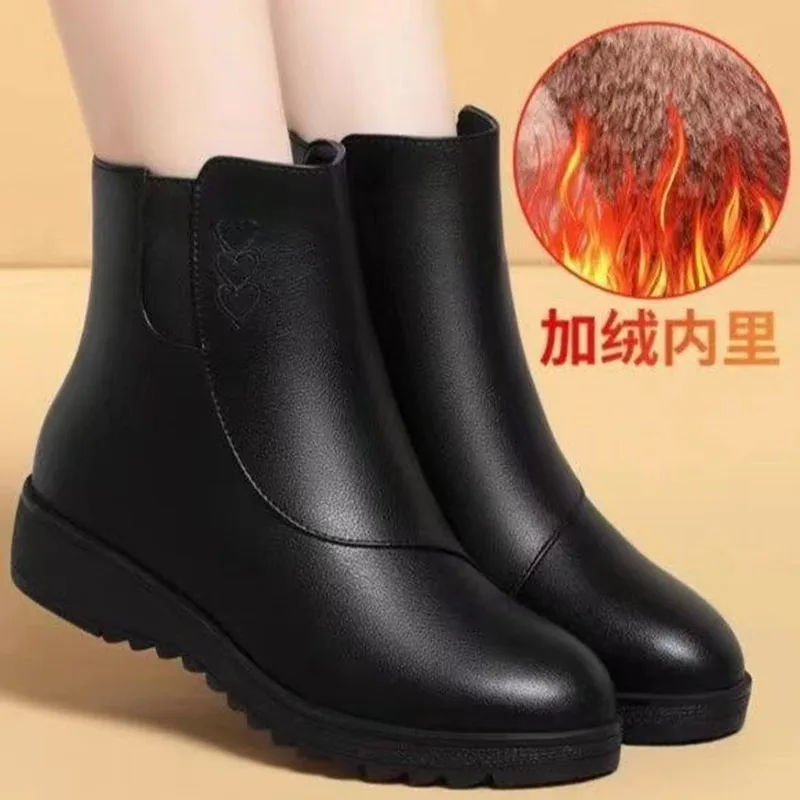 Plana com costura botas modernas dedo do pé redondo sapatos femininos de salto baixo à venda 2025 moda sólida zíper tornozelo botas femininas concisas