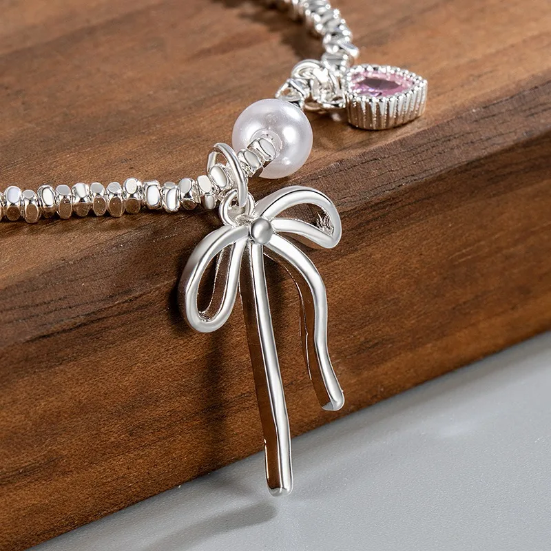 سوار على شكل قلب وردي من الفضة الإسترليني عيار 925 للنساء، سلسلة مجوهرات أنيقة على شكل فيونكة من اللؤلؤ هدية لحفلات أعياد ميلادها