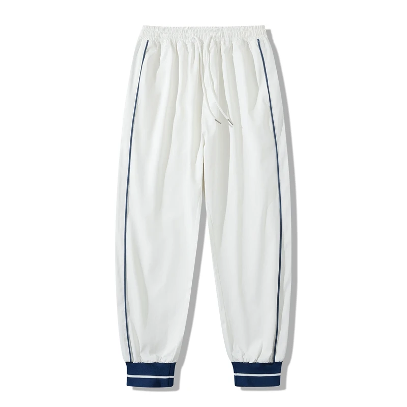 Pantaloni sportivi autunnali da uomo pantaloni Patchwork laterali moda pantaloni da uomo di alta qualità pantaloni larghi da Jogging Casual Streetwear