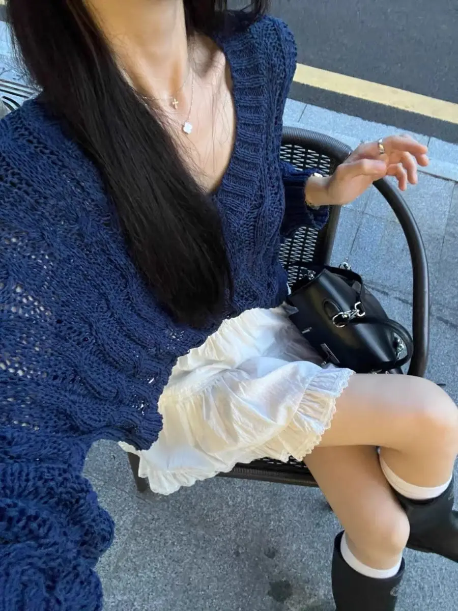 التخسيس تصميم تحسس الجوف خارج ضوء محبوك سترة المرأة Sle أوائل الربيع Faion رقيقة جوفاء تريكو الأعلى