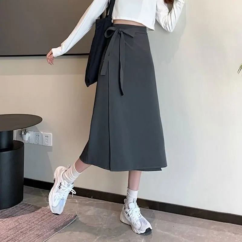 Modne nieregularne spódnice z kokardą Odzież damska Casual A-Line Solid Color Summer All-match High Waist Commute Midi Skirts