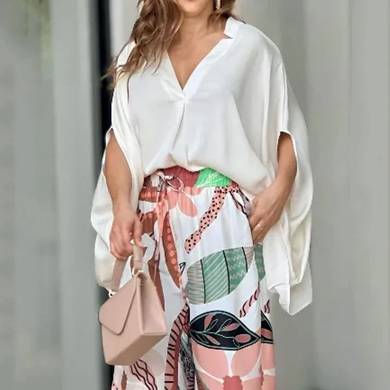 

2024 Two-piece Summer Casual Solid V-neck Batwing Sleeve Loose Top with Wide Legs Printed Stretch Waist Pant Suit Streetwear