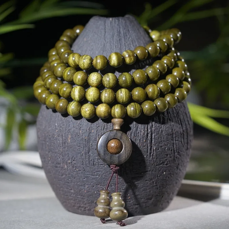 

Браслет-мала из 108 бусин из эбенового дерева с крупными листьями золотистой фиби, с эффектом водной волны, на деревянной нити, ювелирное изделие Вэньвань