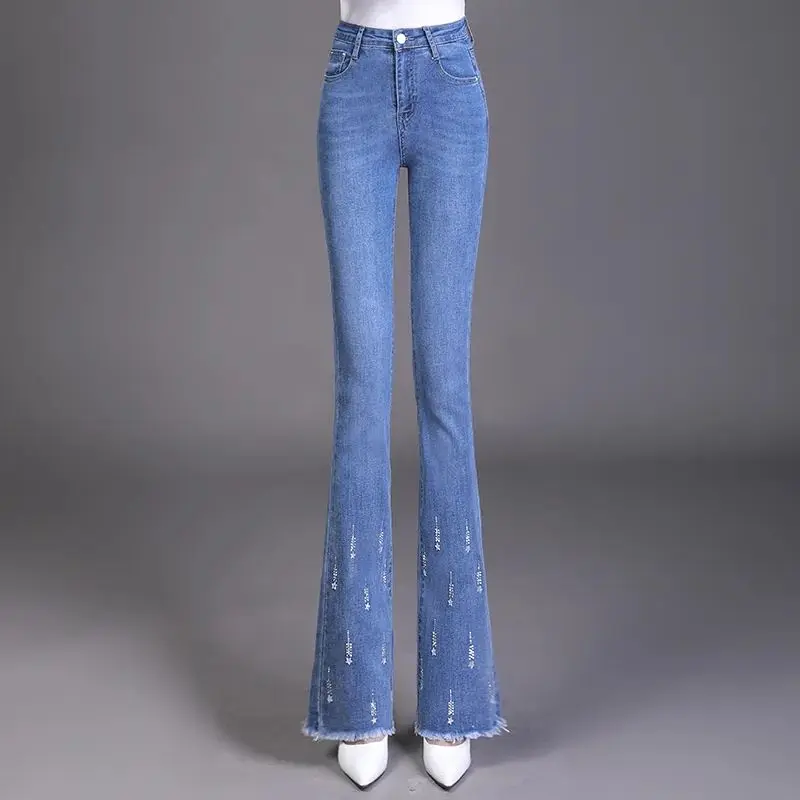กางเกงยีนส์ MODE Korea บานทรงตรงเอวสูงมีพู่ประดับสำหรับสาวออฟฟิศกางเกงยีนส์ฤดูใบไม้ร่วง