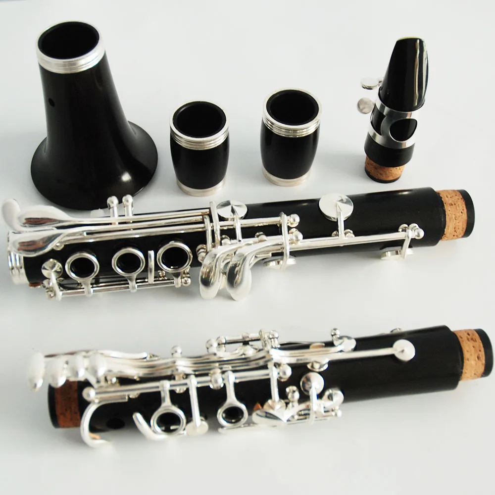 Sell upmarket ebony silver plated C clarinet