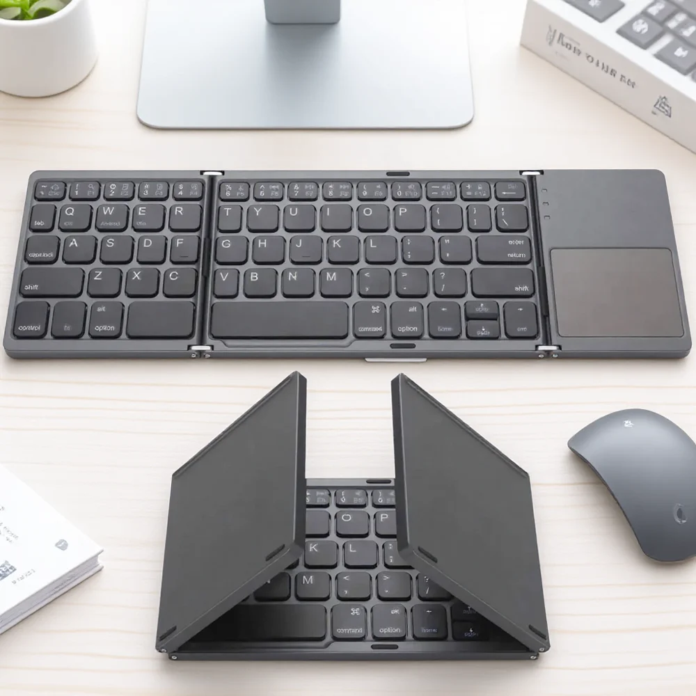 

Portable Mini Bluetooth Wireless Keyboard with Touchpad for Android Windows PC IOS Pocket Sized Foldable Tablet Keyboard
