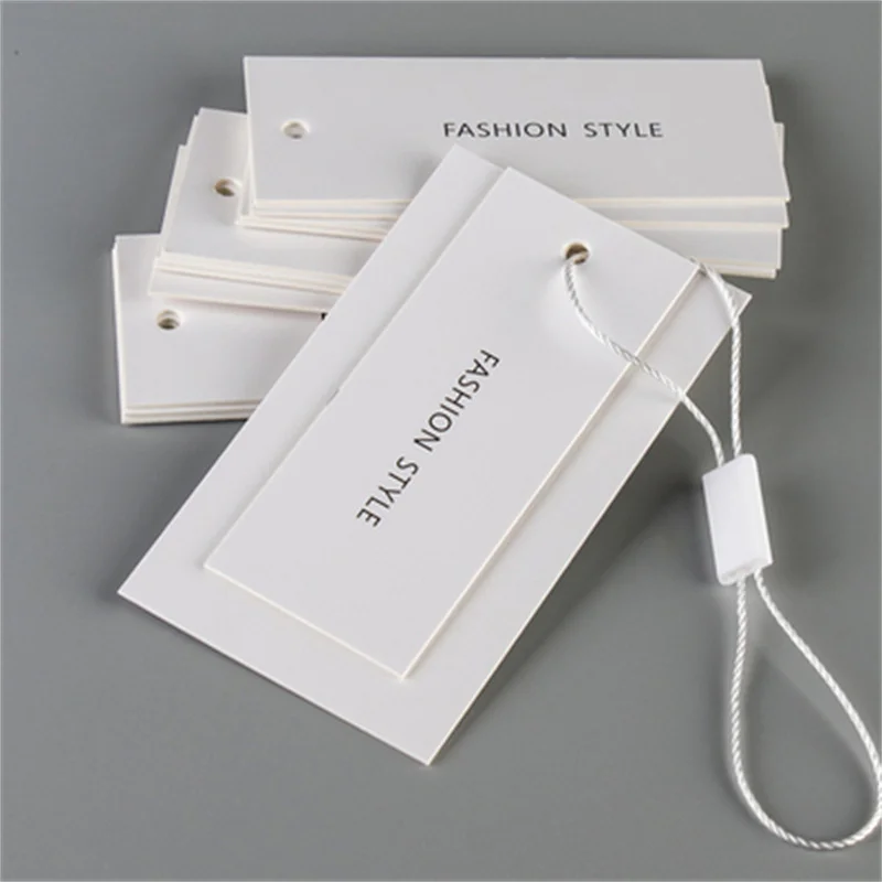 

Custom Fashion Design Logo 500gsm Hot Gold Stamping Hang Tag Brand Name High Quality Clothing Label Custom Paper Hanging Rope