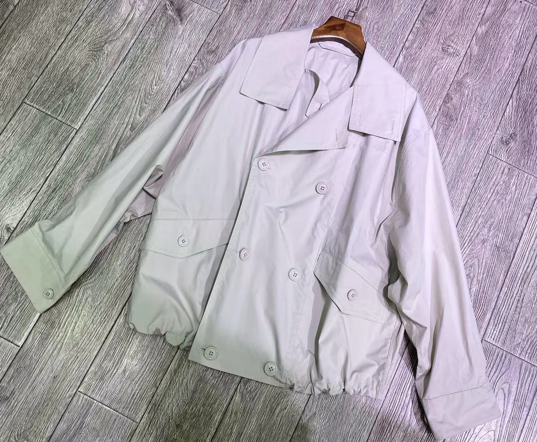 Damski płaszcz typu trencz ze 100% bawełny, dwurzędowy, z wykładanym kołnierzem, długi rękaw, luźny damski płaszcz przeciwdeszczowy.