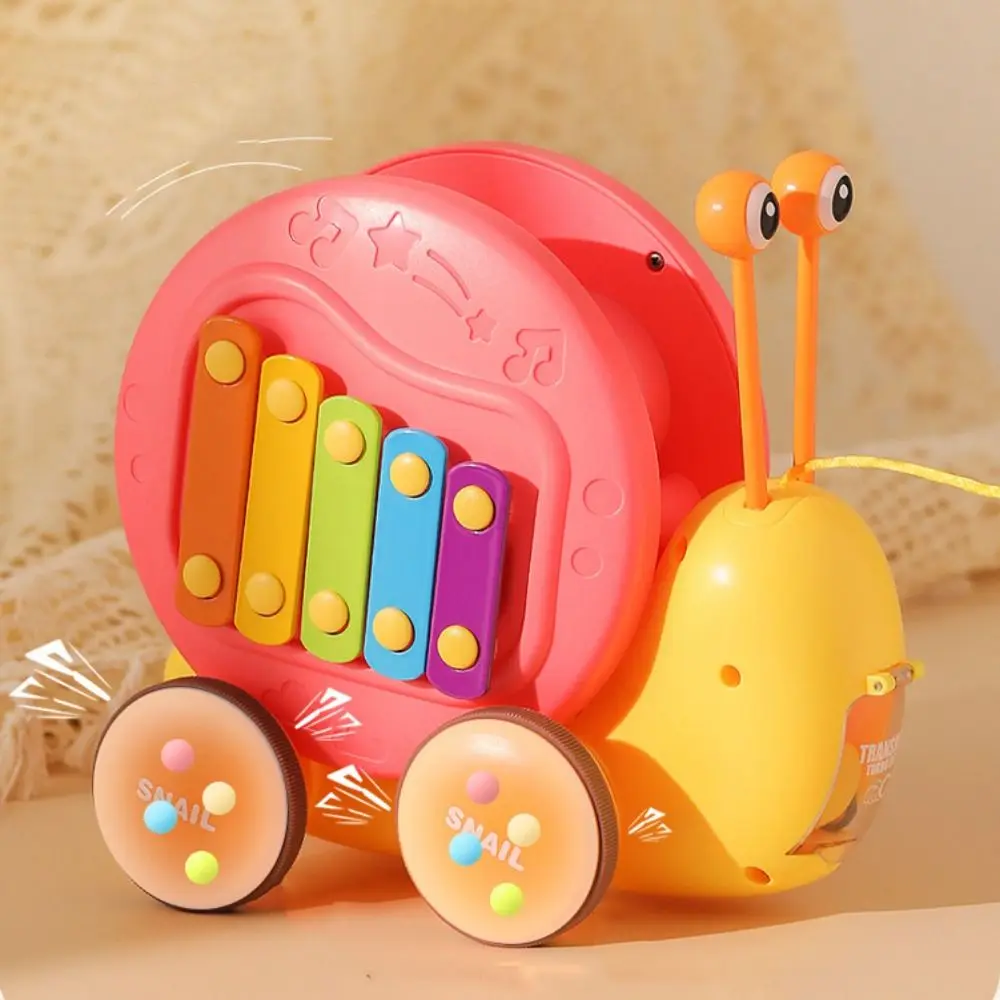 

Baby Walker Pull String Snail Car Toy Cartoon Pet with Music Drag Rope Snail Learning To Walk Knock Pull-Along Snail Toy