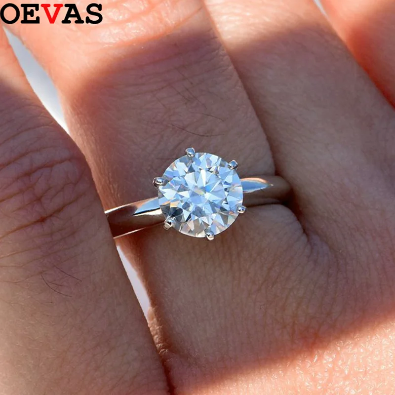 

Свадебные кольца OEVAS 1-5CT D Color с круглыми муассанитами для женщин, 100% стерлинговое серебро 925 пробы с покрытием из 18-каратного золота, ювелирные изделия с лабораторными бриллиантами