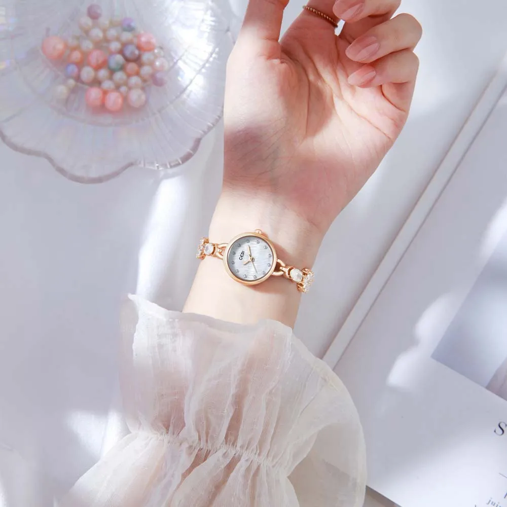 GEDI موضة ساعة نسائية عباد الشمس سوار ساعة خفيفة فاخرة الراقية مجوهرات مزاجه مقاوم للماء ساعة كوارتز للسيدات