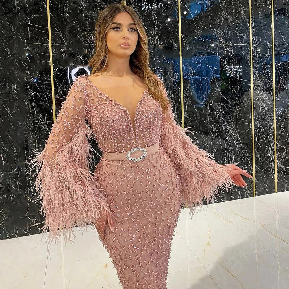 Luxury Blush Pink Prom Dresses 2024 Long Sleeves Wedding Party Dresses Feathers Mid Calf Length Evening Gowns Beading Sheer Neck