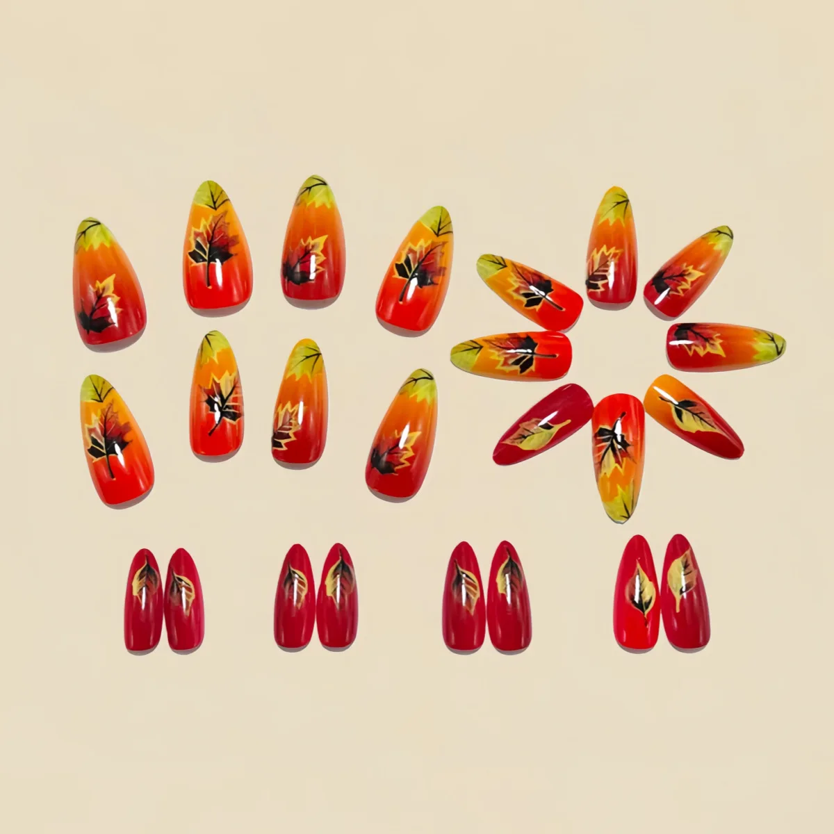 女性・女の子向けの短め・中程度のつけ爪、ゴールド・シルバーの葉っぱ・花柄デザイン、グラデーションオレンジ・グレー、アーモンド・スクエアチップ、プレスオンネイル