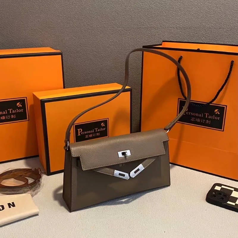 

Kelly palm pattern leather women's bag 2025 new European and American fashion high-end single shoulder messenger baguette bag