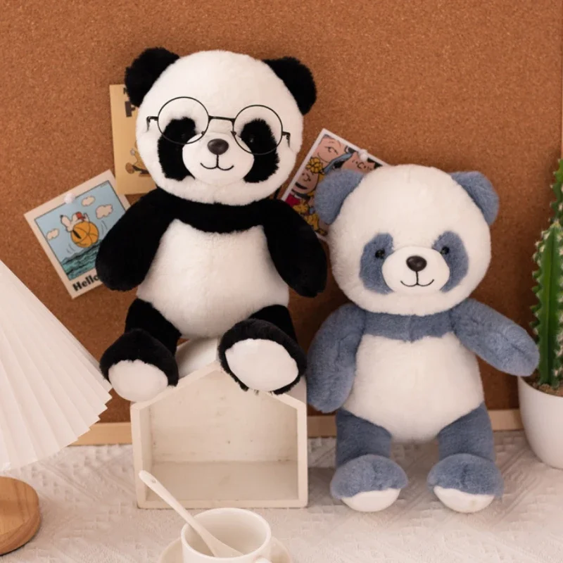 Brinquedos do luxuoso com formas animais múltiplas, preto e branco, pandas, macacos, elefantes, gatos