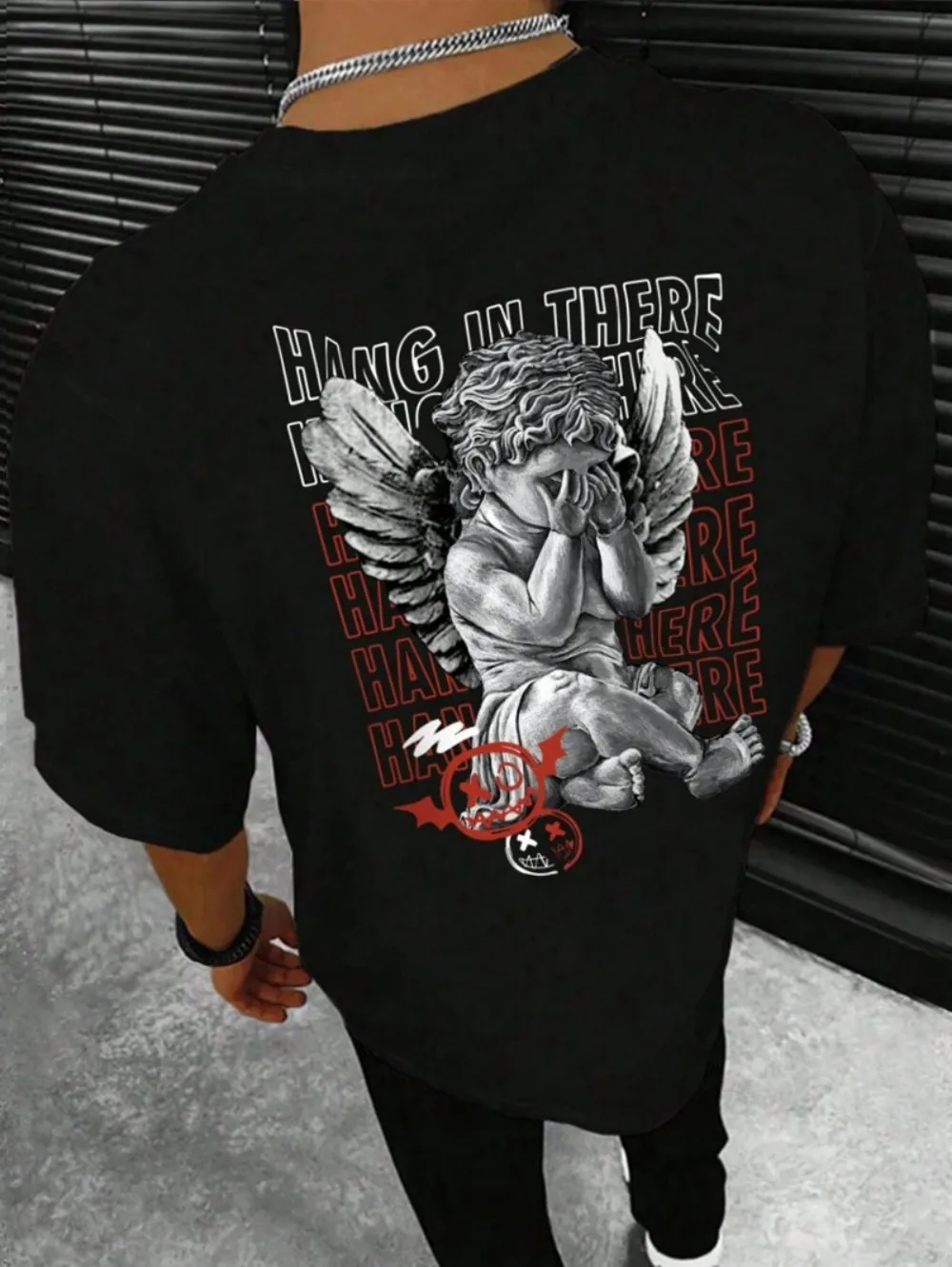 Nueva camiseta de cuello redondo cómoda y transpirable con estampado de angelito de verano para hombres europeos y americanos, top de calle para exteriores