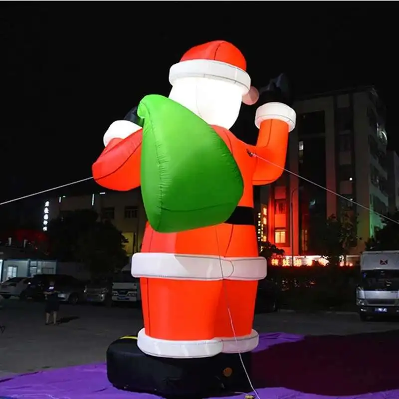 ไฟ LED ยักษ์ Iatable ตกแต่งคริสต์มาสกลางแจ้งขนาดใหญ่ Blow Up ซานตาคลอสพร้อมเครื่องเป่าลมสําหรับวันหยุดคริสต์มาส Yard