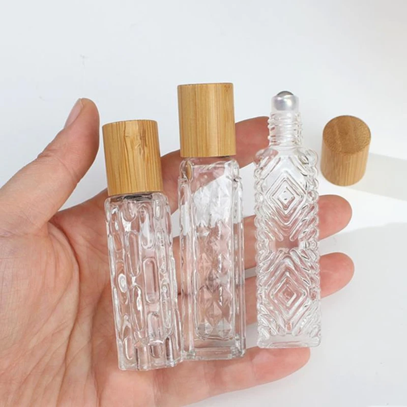 

100Pcs 10ml 12ml Portable Glass Roll on Refillable Bottle for Essential Oil with Stainless Roller and Bamboo Lid Perfume Vial