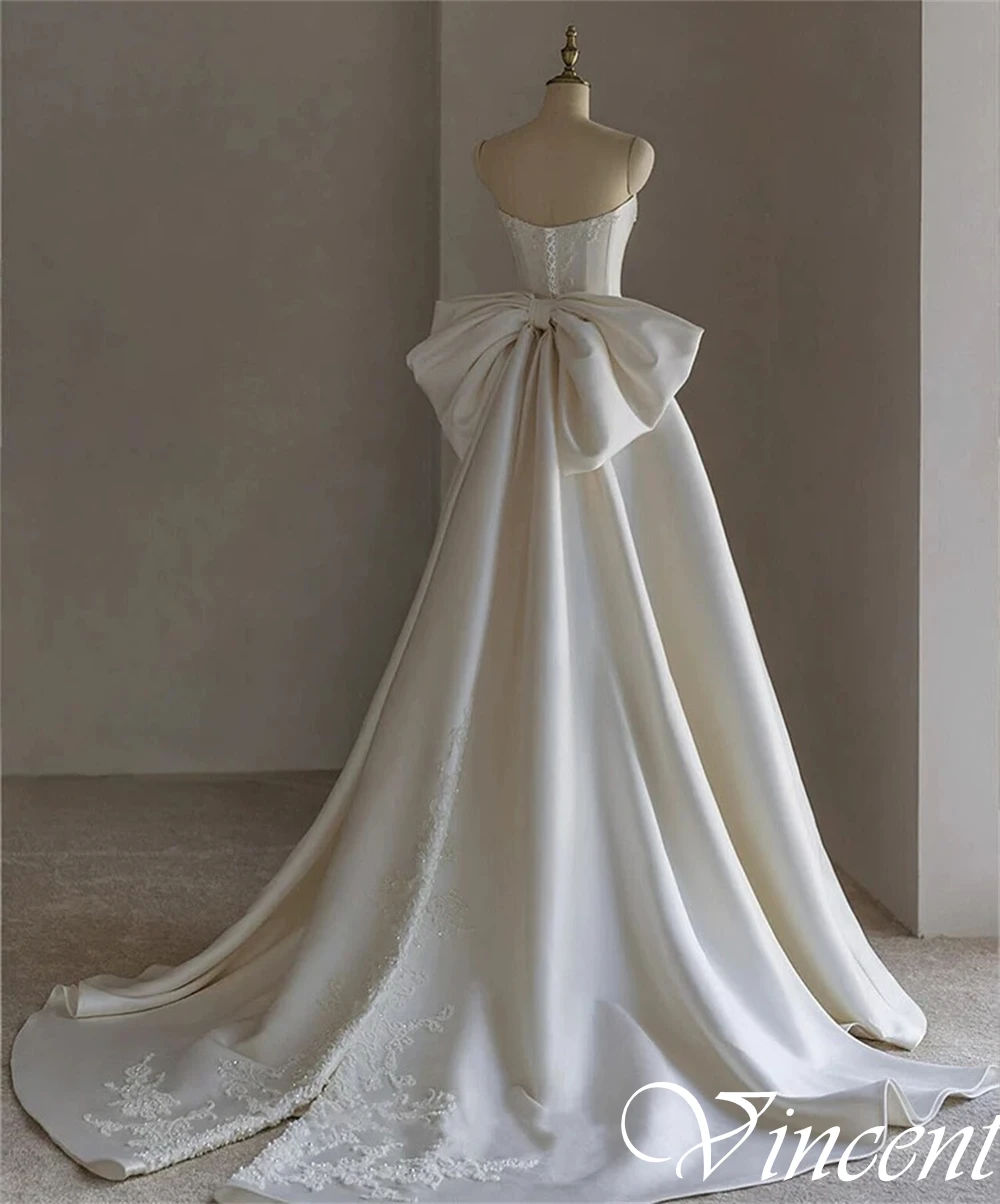 فساتين زفاف عصرية مخصصة بدون حمالات من الساتان بدون أكمام على شكل حرف a فستان زفاف كلاسيكي بفيونكة كريستال عالية الجودة رداء de mariée