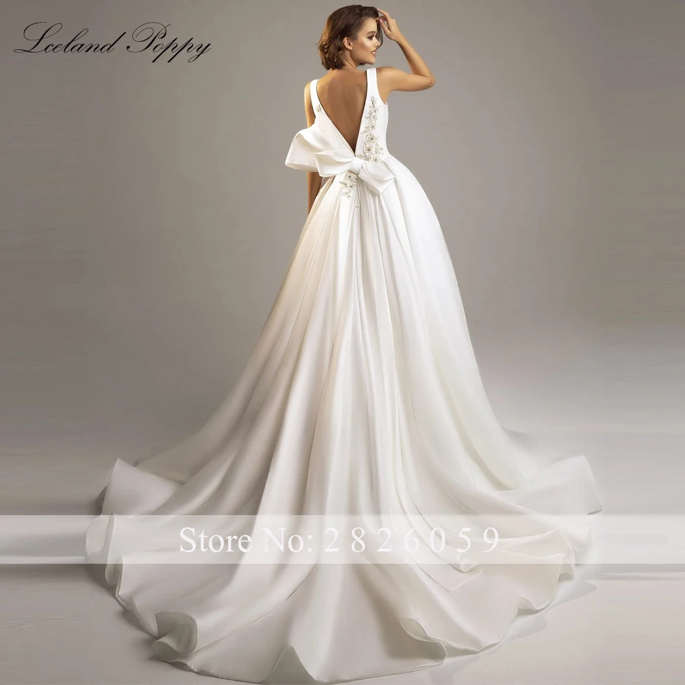 Lceland Poppy Customized A Line V Neck Satin Wedding Dresses Sleeveless Beaded Backless Bridal Gowns with Pockets