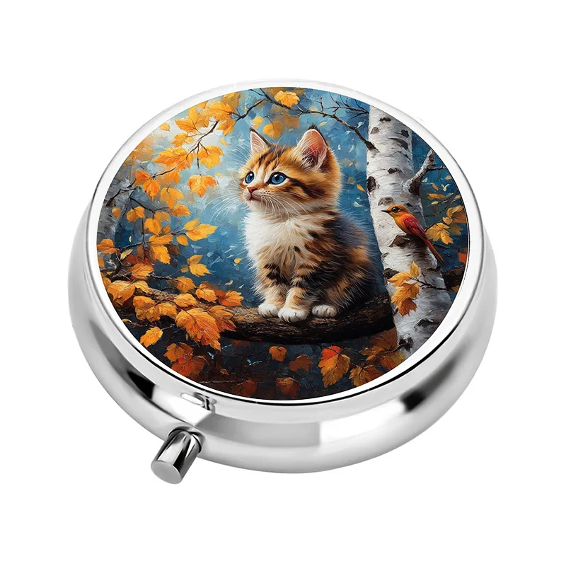 A Portable Pill Box with Three Compartments, Designed with Autumn-Themed Kitten and Bird Patterns. This Compact Pill Box Is Perfect for Carrying in Your Pocket or Purse.