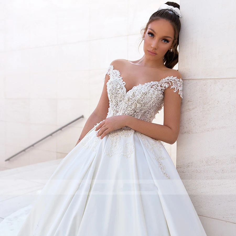 Sexy Tắt Shoulder Wedding Dresses A-Line Ren Đính Của Phụ Nữ Thanh Lịch Bãi Biển Không Tay Đảng Satin Hạt Đính Bridal Gowns