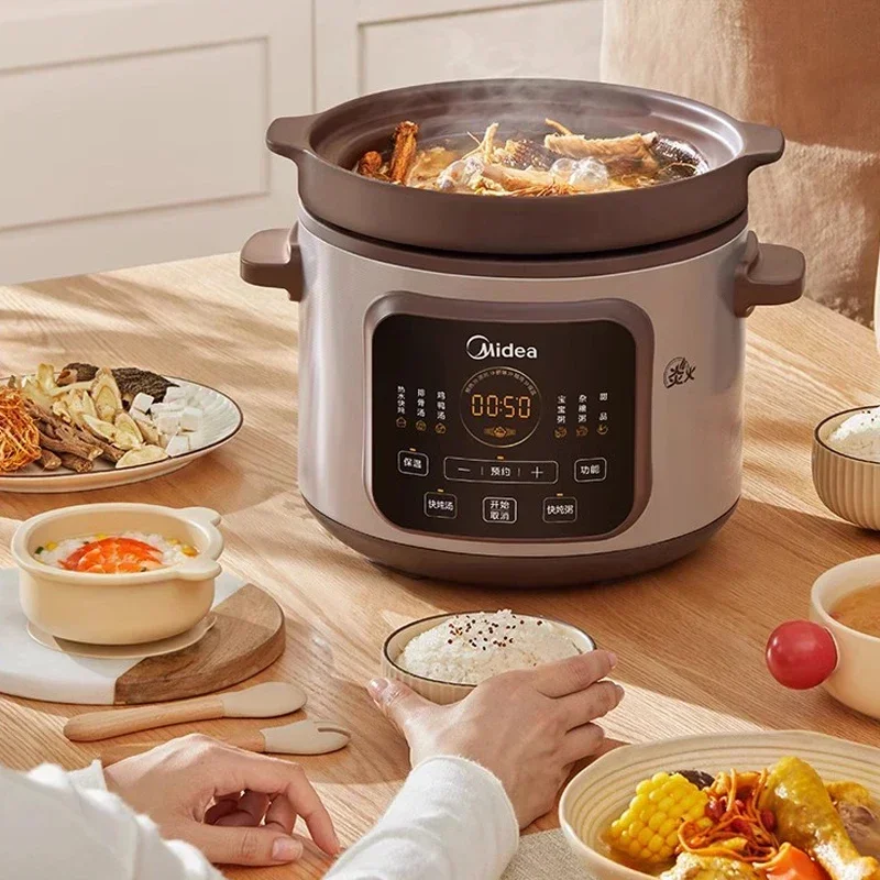 Midea สีม่วงหม้อสตูว์ไฟฟ้าหม้อใช้ในครัวเรือนอัตโนมัติเซรามิคซุปสตูว์ทําอาหารโจ๊กหม้อไฟฟ้า Stewpot