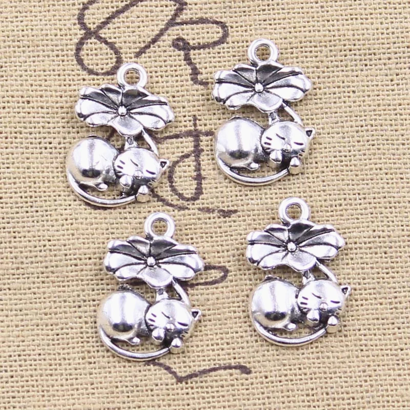 20 szt. Zawieszki z motywem śpiący kot pod kwiatem lotosu 20x14mm w kolorze antycznego srebra