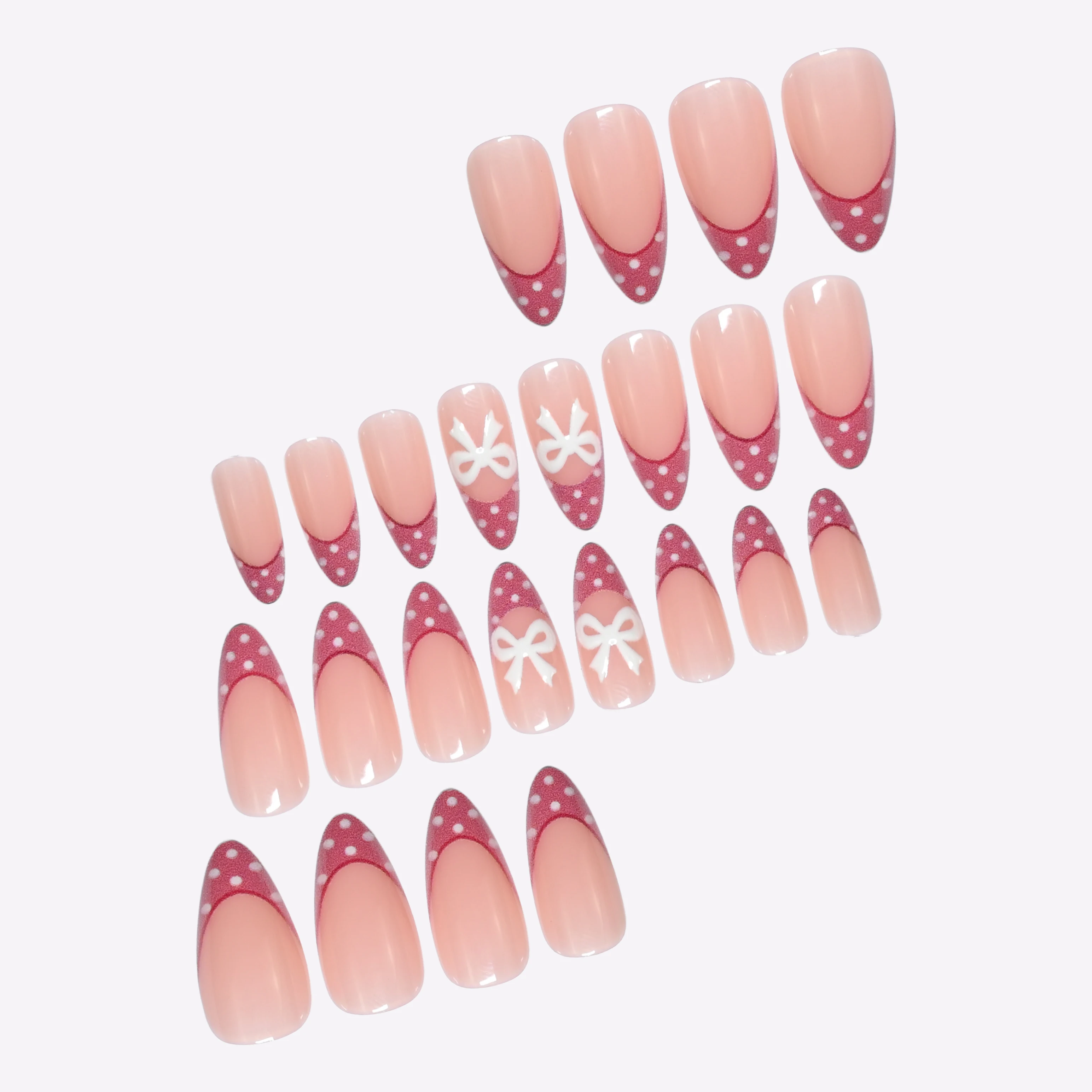 A complete set of 24 medium almond fake nails, designed with pink polka dot French tip and white bow pattern, including 1 jelly