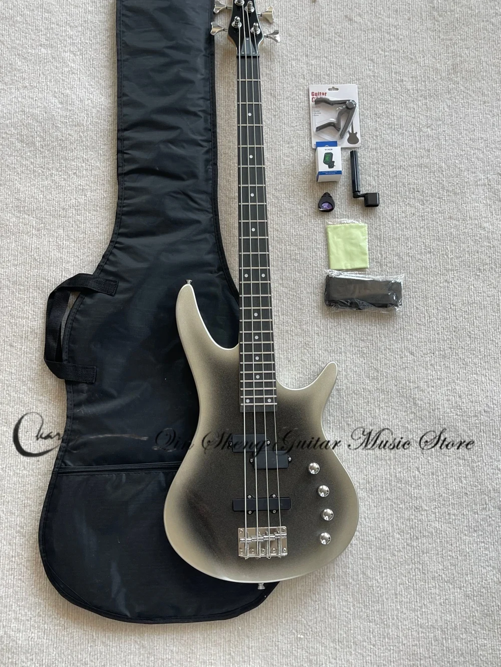 4 strings sliver bass guitar, black solid wood body with maple neck, fixed bridge, included bass bag and tuning clips