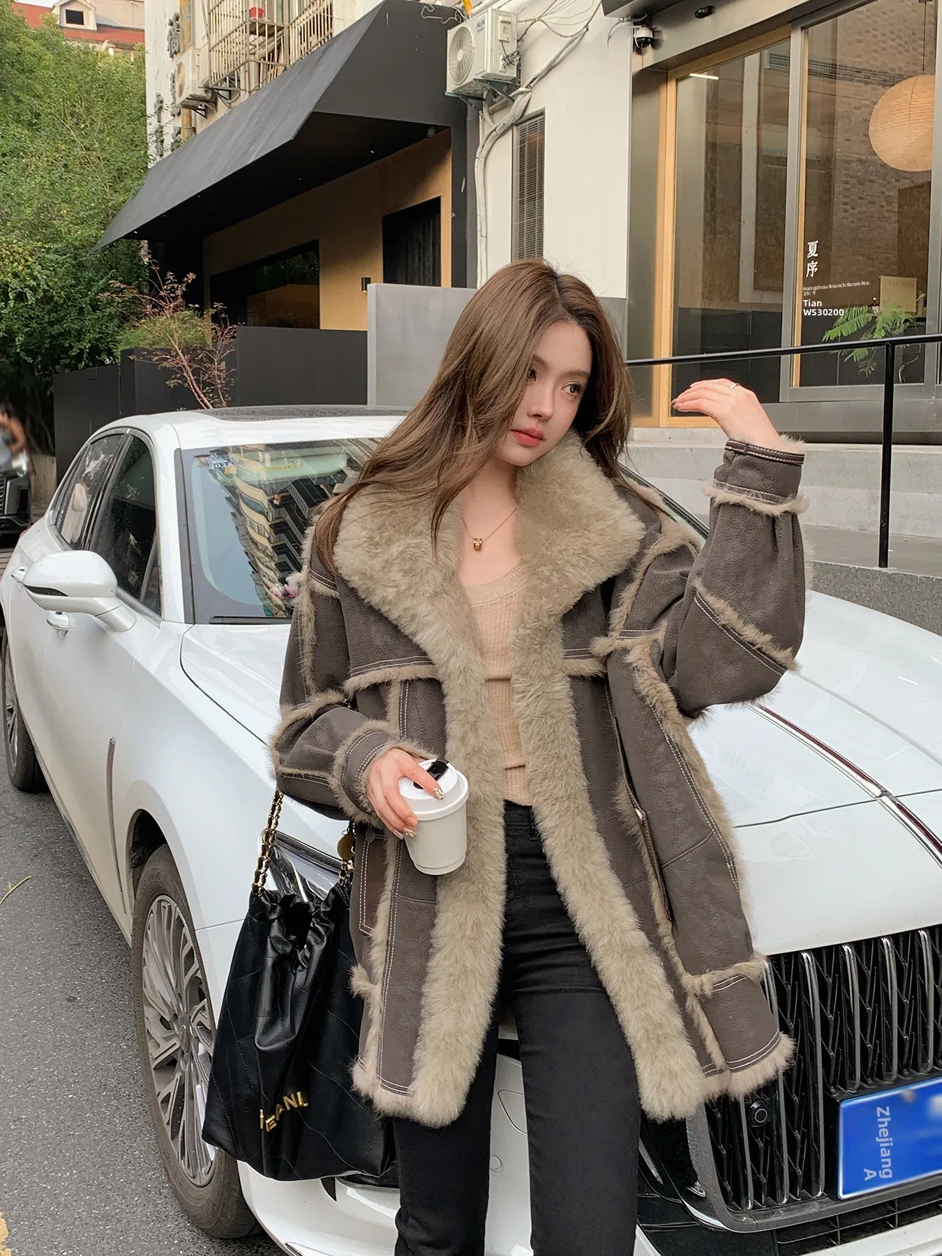 Automne hiver nouveau Sle moto fourrure de lapin épissage laine cuir manteau femmes Version ample moyen Long manteau Fem modèle