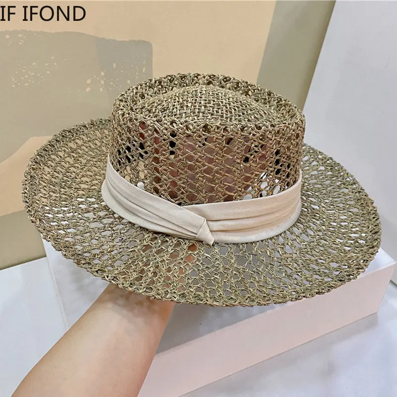 Nowe naturalne trawy kapelusze słomkowe dla kobiet lato płaskie rondo przeciwsłoneczne kapelusze plażowe moda Hollow Holiday Cap Chapeau Femme
