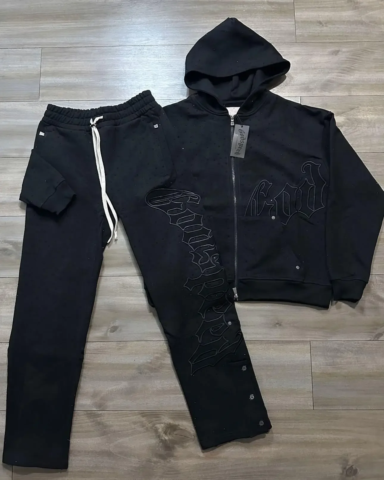 ชุดเซ็ตเสื้อฮู้ดดี้พิมพ์ลายตัวอักษรแบบซิปสไตล์อเมริกันเรโทรสตรีทสำหรับผู้ชายและผู้หญิง พร้อมกางเกงวอร์มขายาว ชุดสองชิ้นสไตล์ Y2K