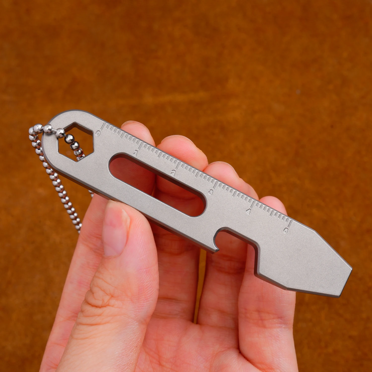 

1 шт., 3,15 дюйма, титановая монтировка, многофункциональный маленький инструмент, портативный EDC своими руками, с цепочкой из нержавеющей стали для улицы, кемпинга, пешего туризма