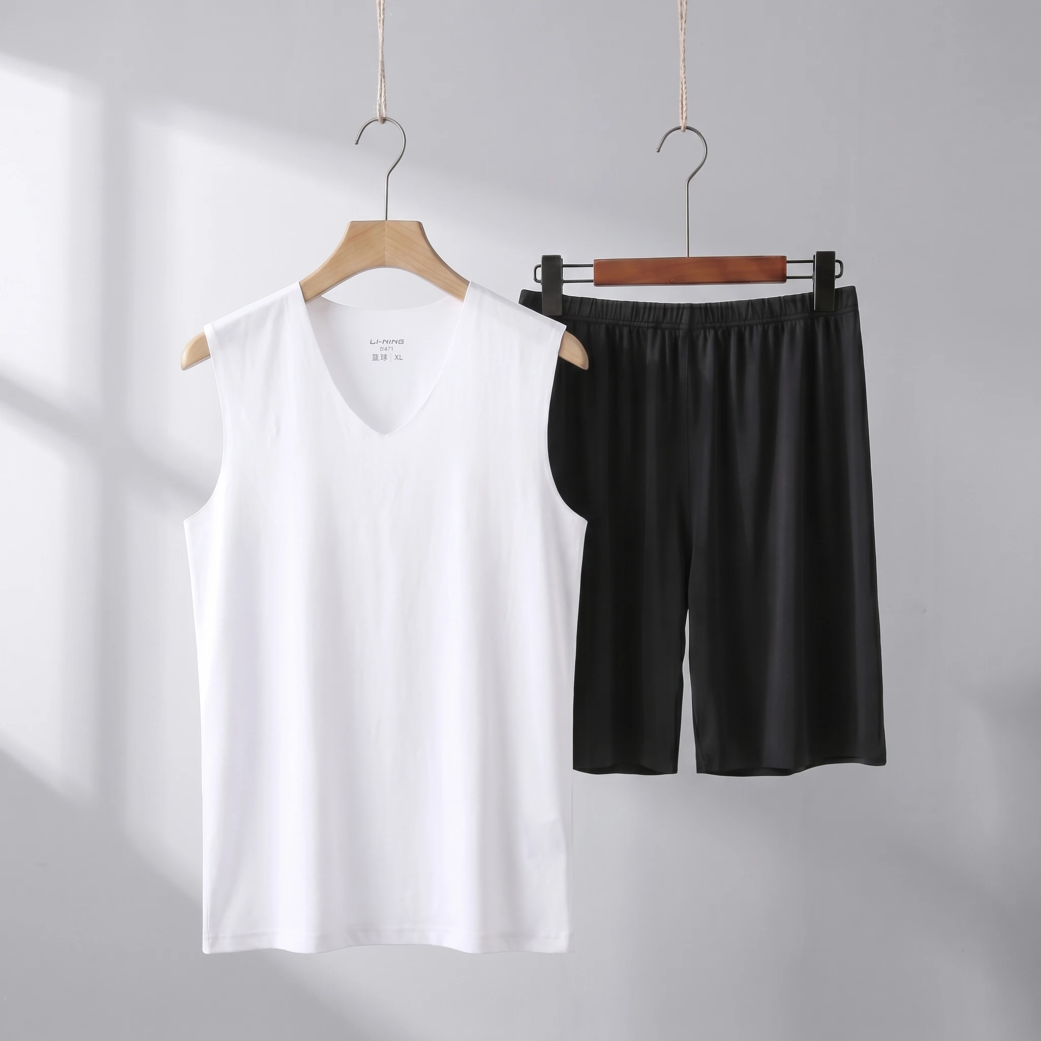 White vest + black shorts