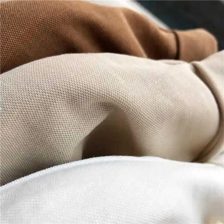 

Summer 2024 Loose Design Hepburn Pique irt ort Sve Vintage Top with ket French Sle Button Detail Regular Length