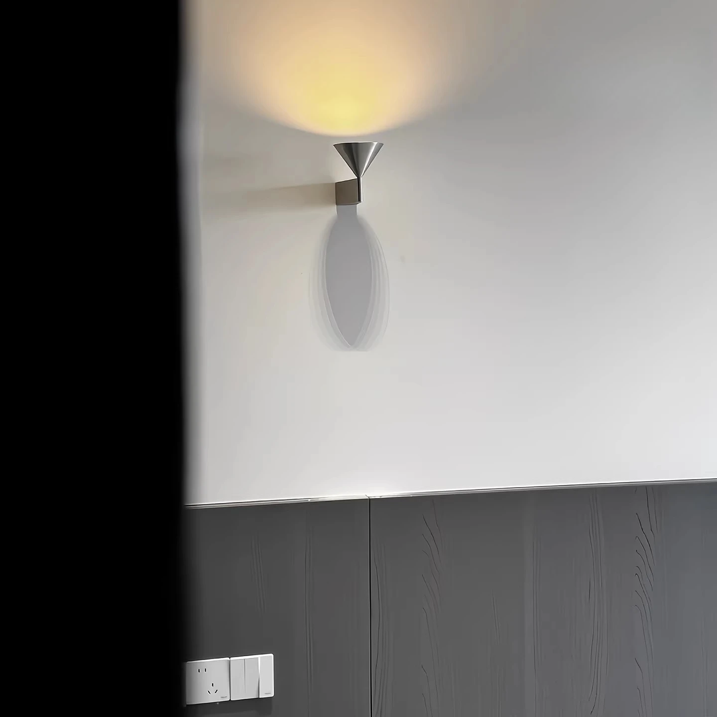 Minimalist bedroom bedside wall lamp New conical geometric minimalist designer background wall material, aluminum