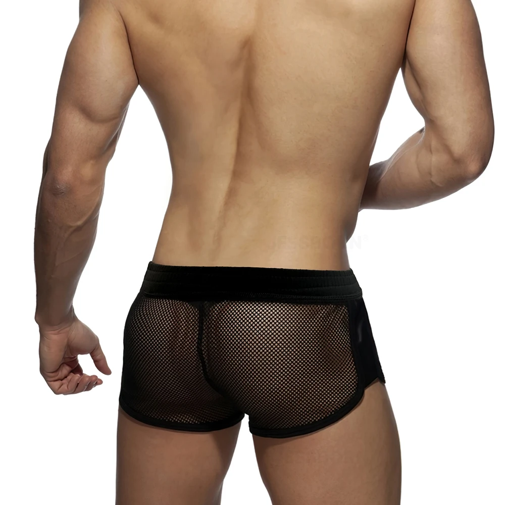 Calzoncillos transparentes de malla fina para hombre, ropa de dormir Sexy para el hogar, pantalones de salón, pijama de poliéster convexo con bolsa