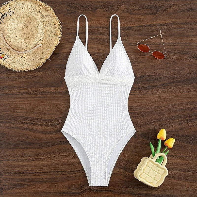 ชุดว่ายน้ําวันพีชเซ็กซี่ลึก V สีทึบใหม่สําหรับผู้หญิง เรียบง่ายและสวยงามสําหรับการว่ายน้ําในวันหยุด ฟิตเนส และอาบแดด