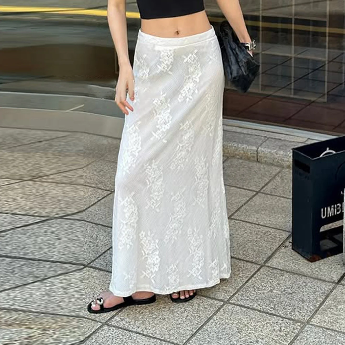 

Autumn new white temperament elegant lace stitching skirt Europe and the United States straight slim low waist dress.