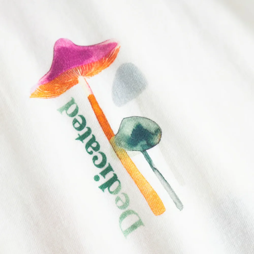 

DEDICATED 2025 Summer! Stockholm Color Mushrooms Breathable training Tee— White × Watercolor Fairy Tale ‘Healing Grove Tech’