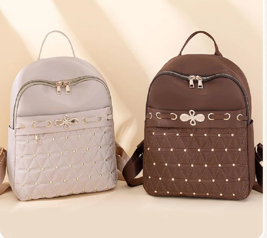 Hot Sale Fashion Waterproof Nylon Backpacks Women's Casual Large Capacity Travel Shoulder Bags School Bag Rivet Backpack