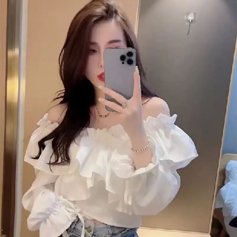 Chemise à volants pour femmes, nouveau Style, haut à manches évasées Unique