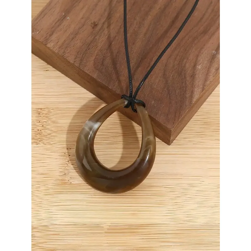 

Геометрический акриловый кулон в форме капли на черном шнурке из искусственной кожи