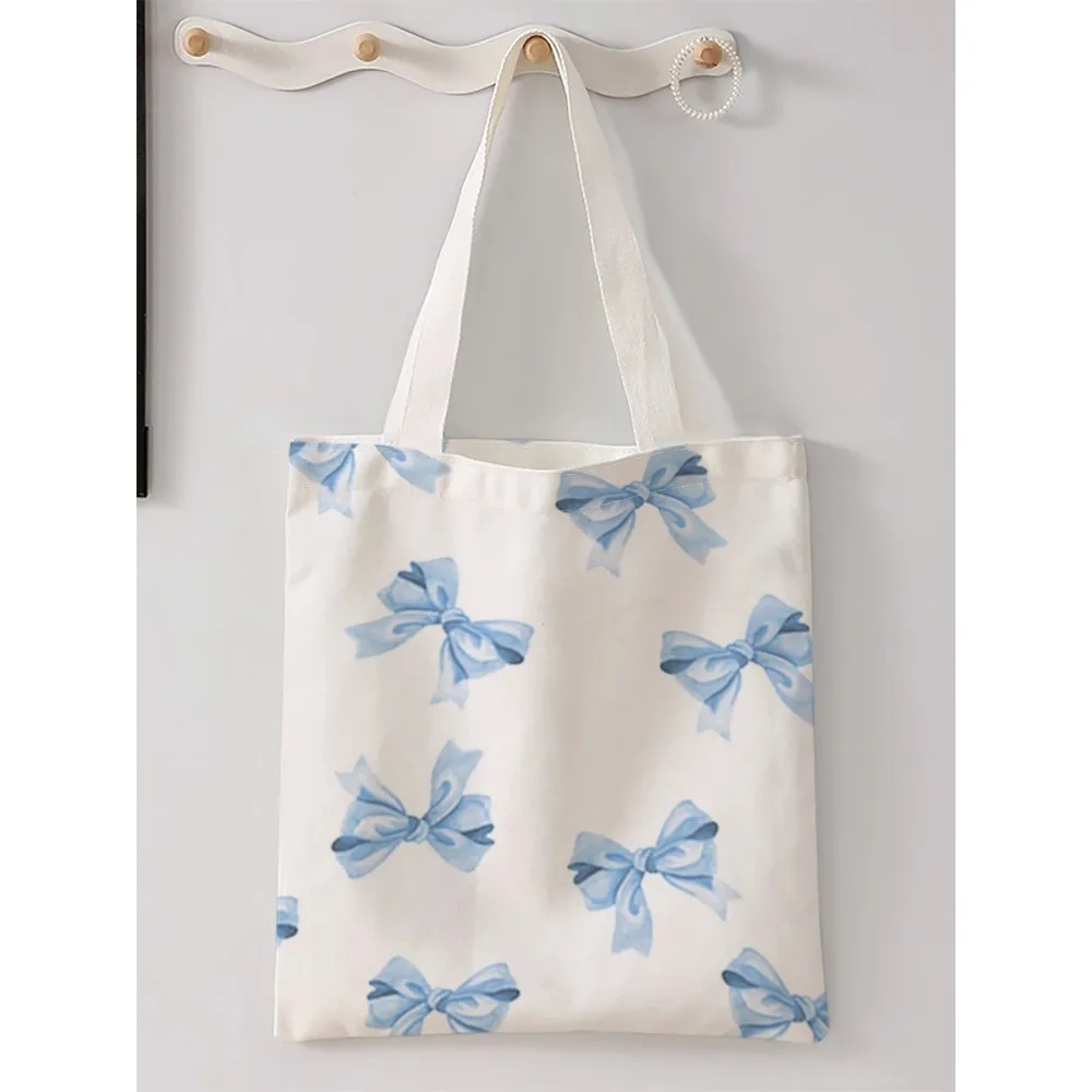 

Bow pattern printed casual handbag, reusable fashionable backpack, multifunctional handbag, canvas shopping bag
