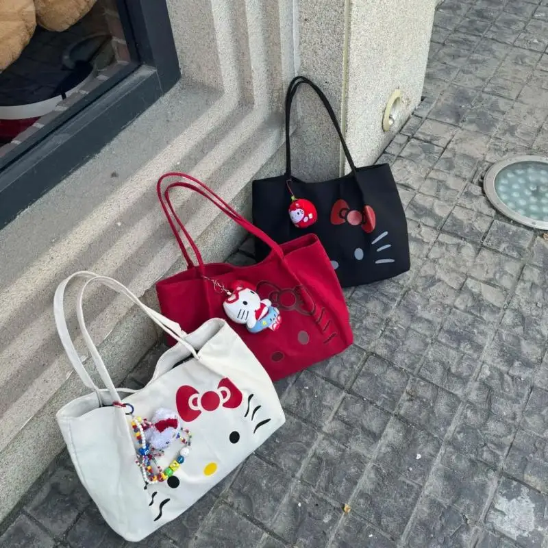 حقيبة كتف سانريو هالو كيتي للركاب مطبوعة برسوم كارتونية حقيبة يد كاواي ذات سعة كبيرة هدية عيد ميلاد محمولة للفتيات